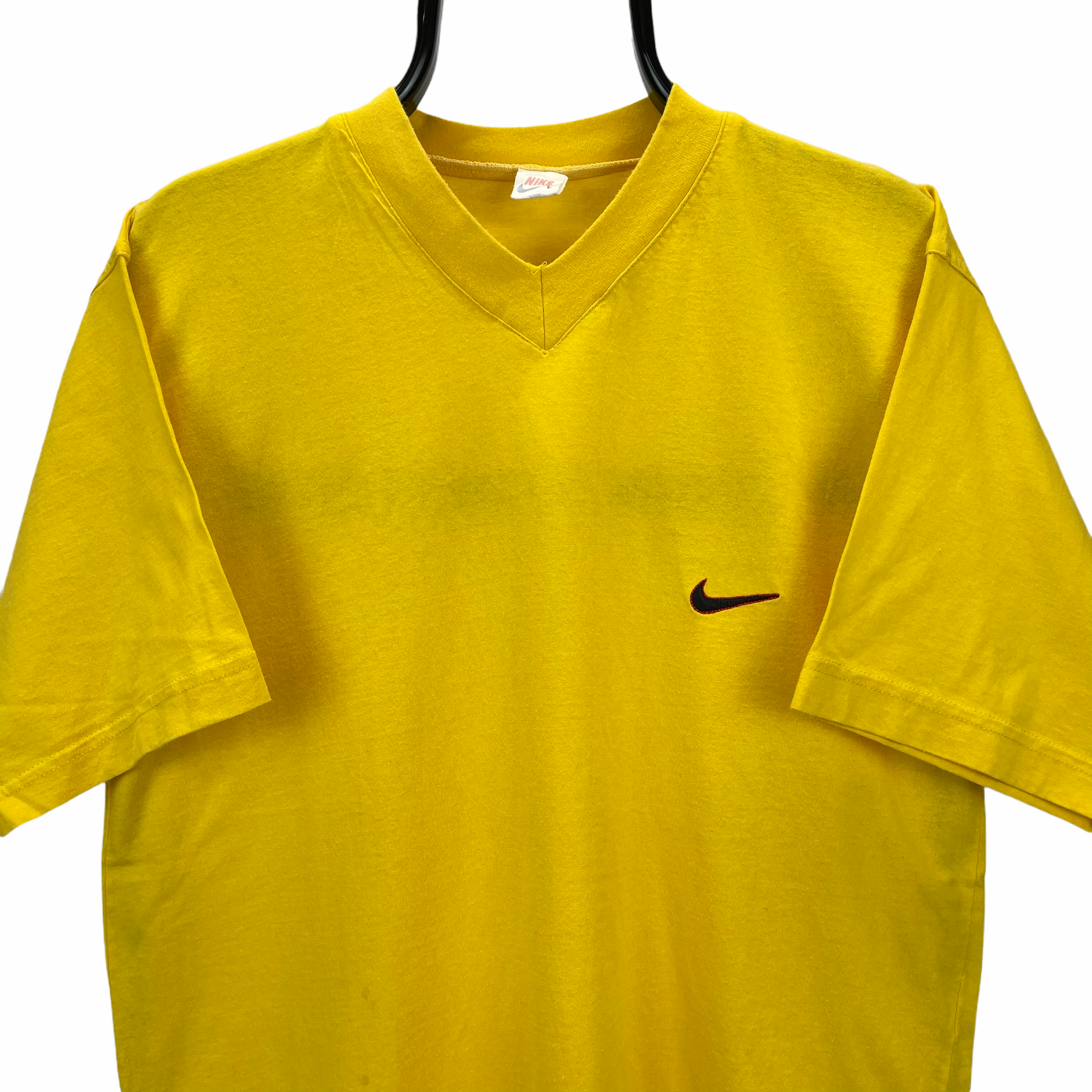 VINTAGE 90S NIKE EMBROIDERED SMALL SWOOSH TEE IN YELLOW - MEN'S LARGE/WOMEN'S XL