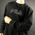 Vintage Fila Spellout Sweatshirt in Black - Large - Vintique Clothing