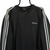VINTAGE 80S ADIDAS EMBROIDERED SMALL SPELLOUT SWEATSHIRT IN BLACK - MEN'S MEDIUM/WOMEN'S LARGE