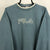 Vintage Fila Embroidered Spellout in Baby Blue - Men's Medium/Women's Large
