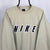 Vintage 90s Nike Spellout Sweatshirt in Beige - Men's Medium/Women's Large