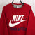 Vintage 00s Nike Spellout Sweatshirt in Red - Men's Medium/Women's Large