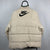 Nike Corduroy Spellout Puffer Jacket in Beige - Men's Large/Women's XL