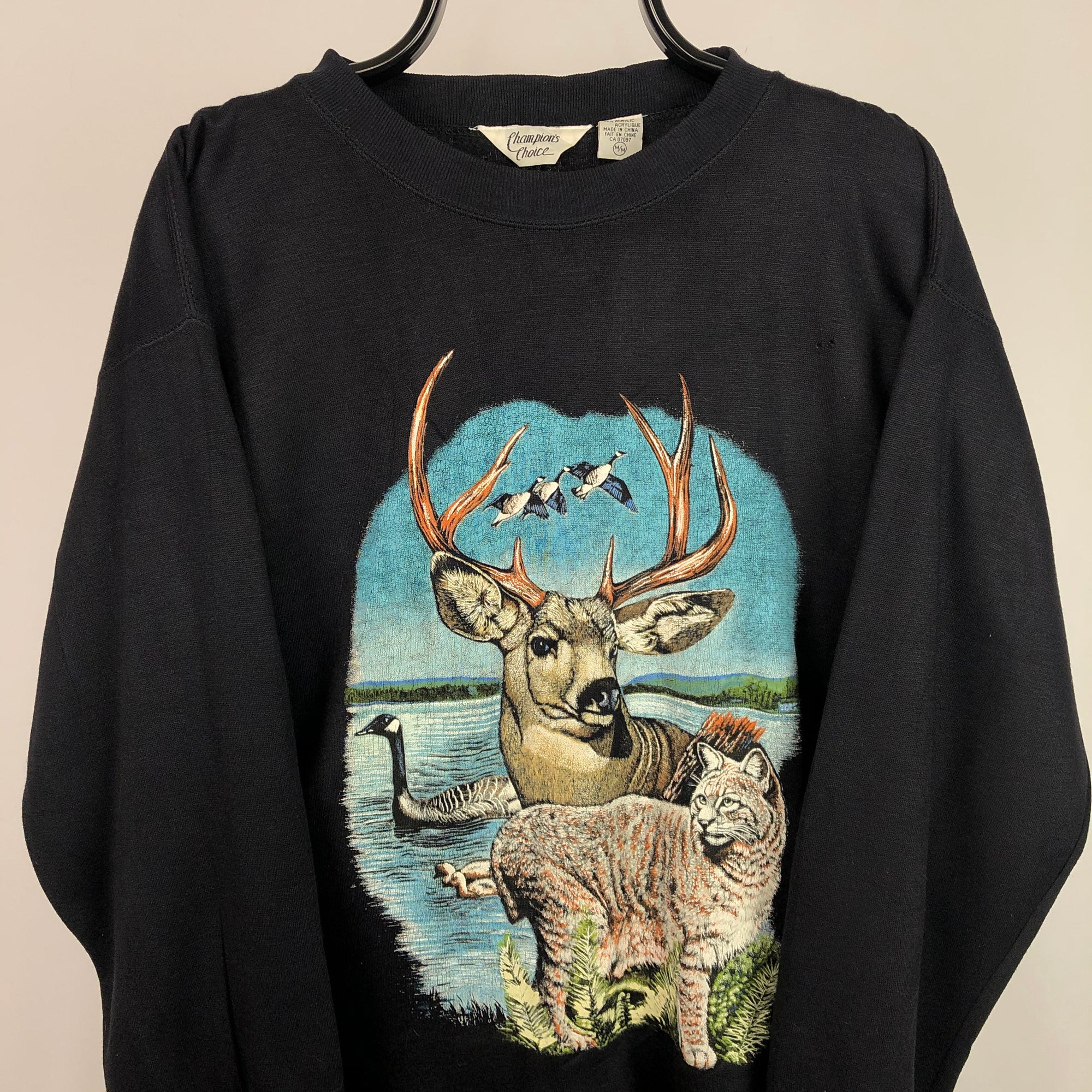 Vintage 90s Wildlife Print Sweatshirt in Black - Men's Medium/Women's Large