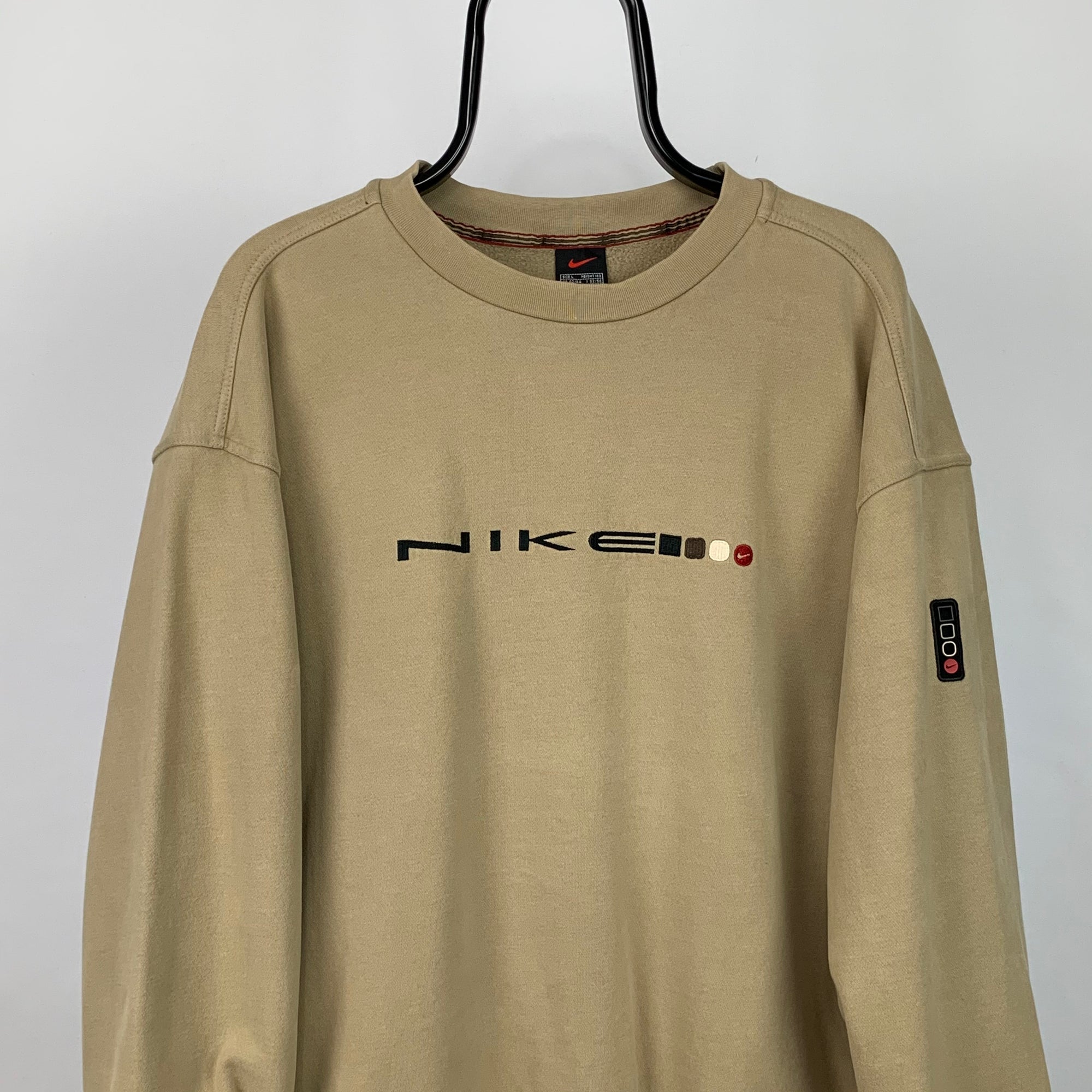 Vintage 90s Nike Embroidered Spellout Sweatshirt in Beige - Men's Large/Women's XL