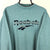 Vintage 90s Reebok Spellout Sweatshirt in Blue/Green - Men's Medium/Women's Large