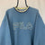 Vintage 90s Fila Spellout Sweatshirt in Blue/Beige - Men's Large/Women's XL