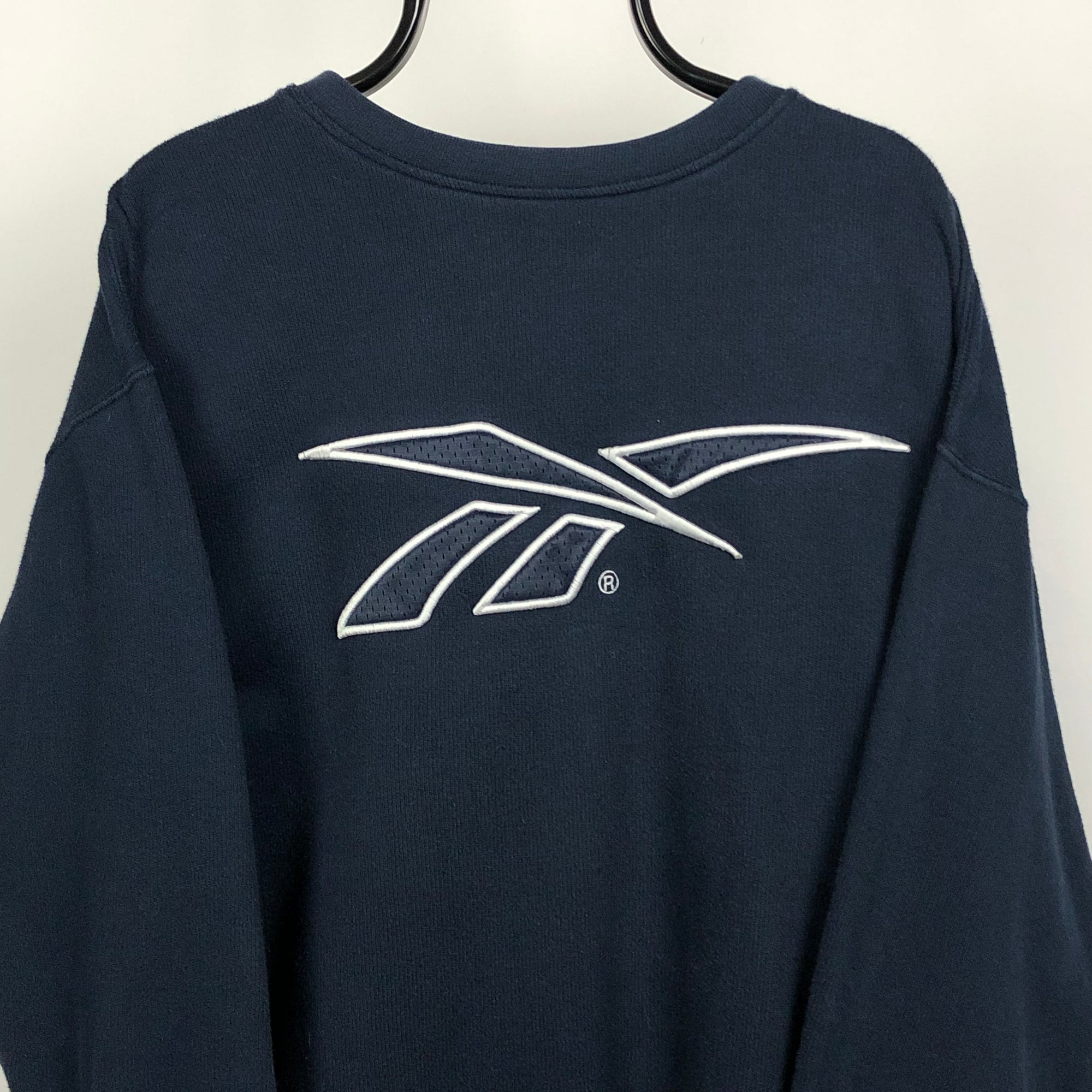 Vintage Reebok Embossed Logo Sweatshirt in Navy - Men's XL/Women's XXL