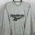Vintage Reebok Spellout Sweatshirt in Grey - Men's Medium/Women's Large