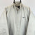 VINTAGE 90S NIKE BIG SWOOSH QUILTED JACKET IN BONE - MEN'S LARGE/WOMEN'S XL