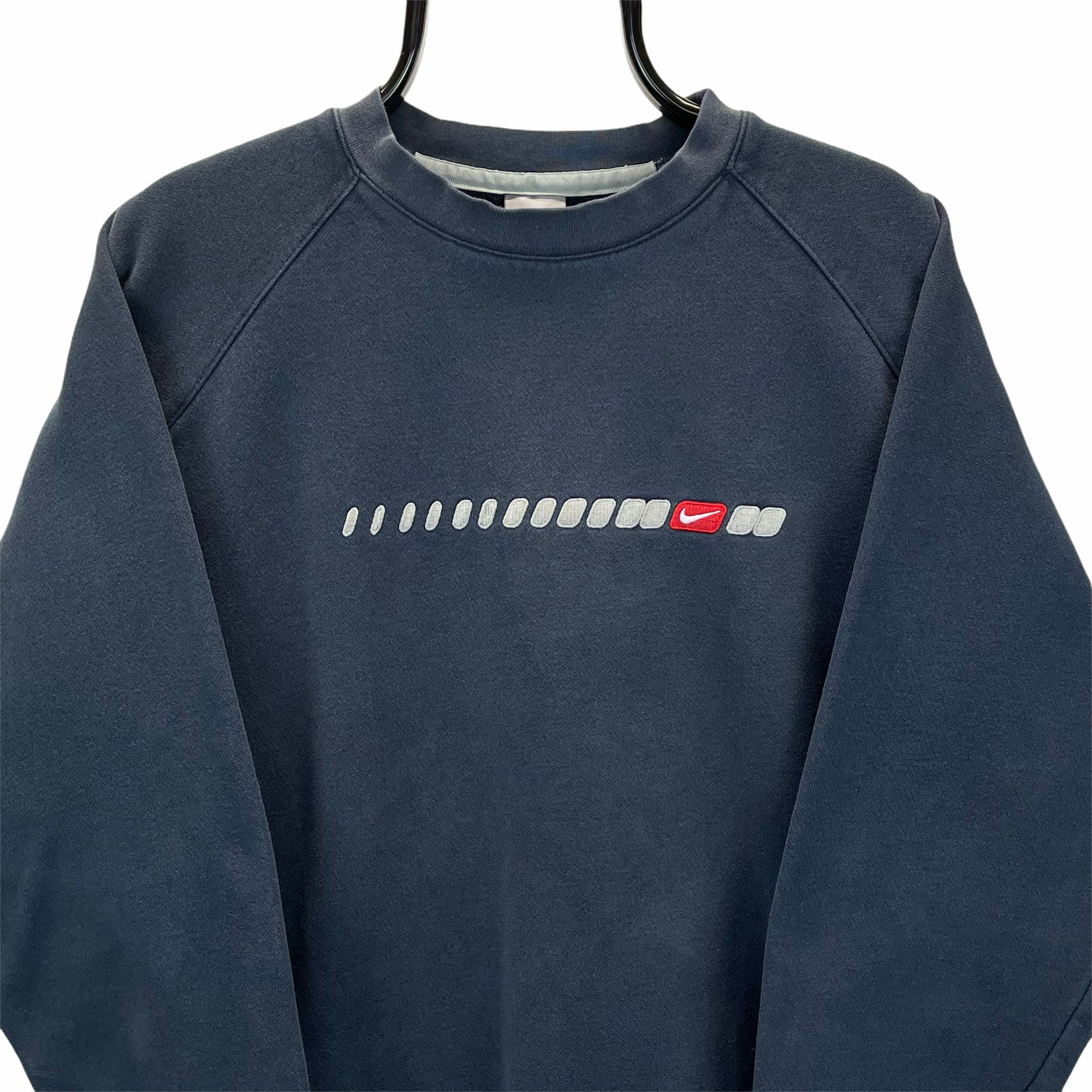 VINTAGE NIKE EMBROIDERED SMALL SWOOSH SWEATSHIRT IN WASHED NAVY - MEN'S MEDIUM/WOMEN'S LARGE