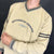 Vintage Umbro Spellout Sweatshirt in Beige - Vintique Clothing